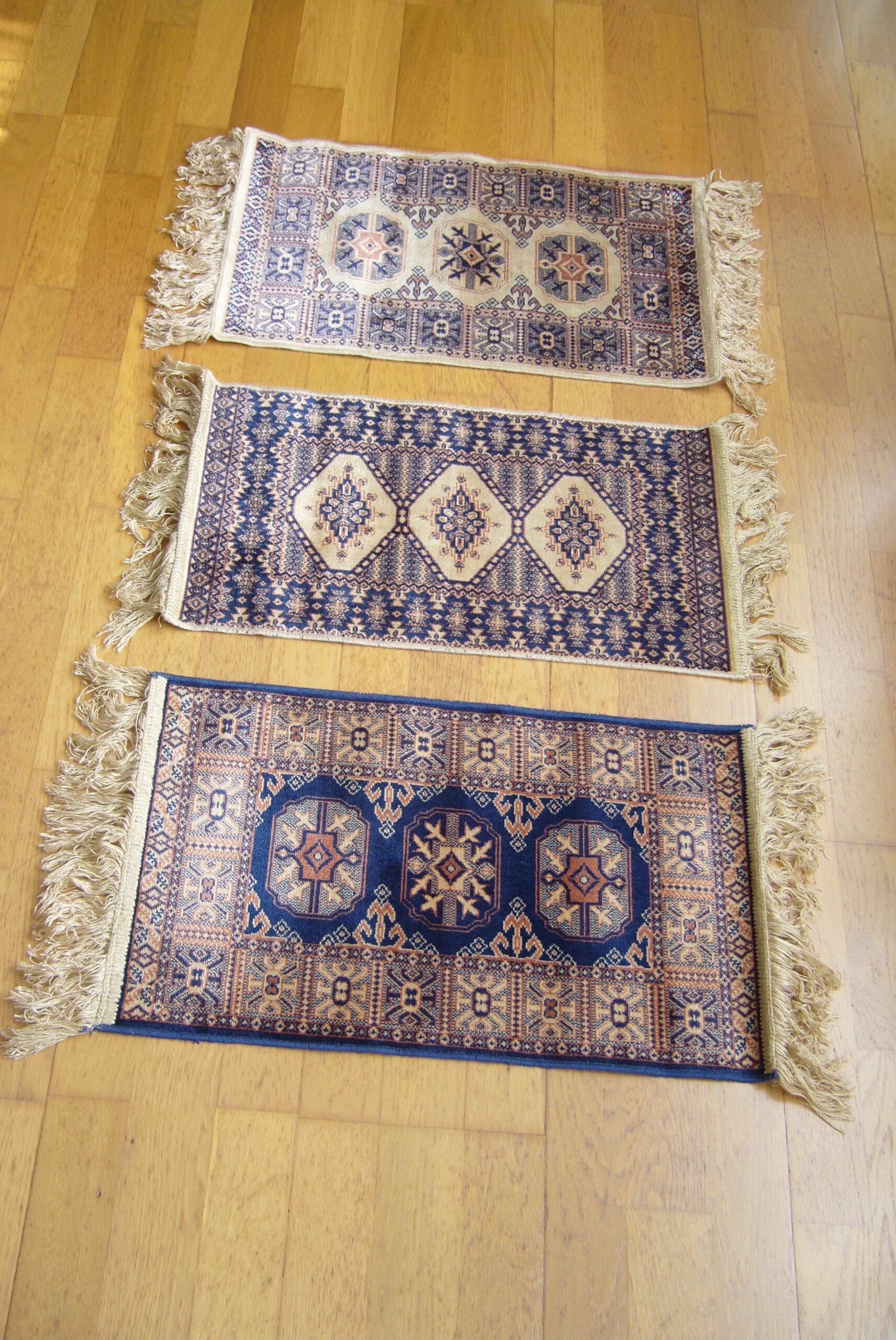Three oriental rugs 35 x 70 cm