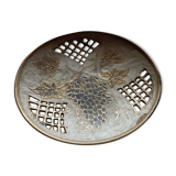 Empty pocket in openwork copper, chiseled and painted vine branches