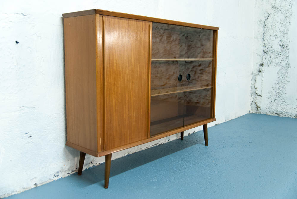 Console with sliding doors