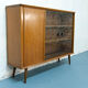Console with sliding doors