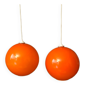 Pair of orange glass ball suspensions, 70s.