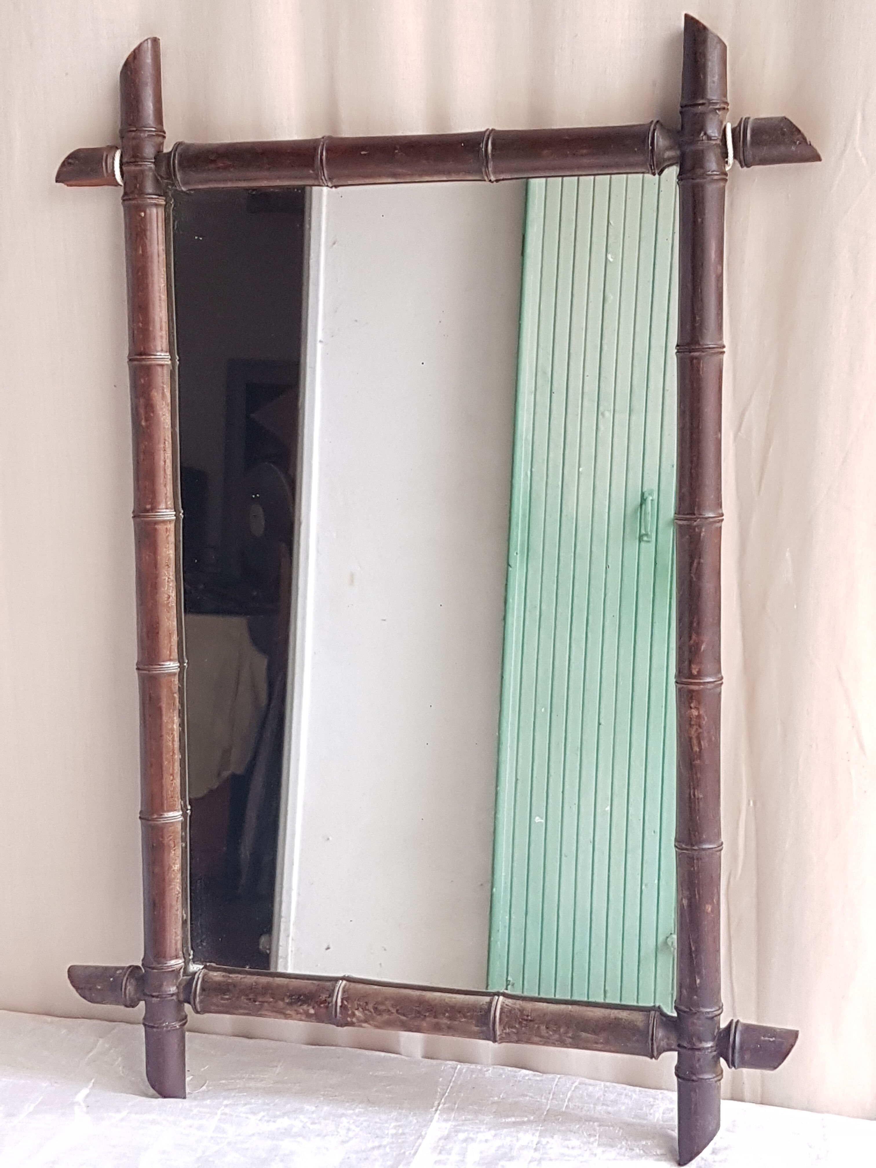 Ancient rattan mirror "78 x 54.5 cms"