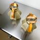 Pair of "Cocoon" wall lights in resin and pine, Italy, circa 1970