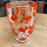 Glass vase with fish inclusions