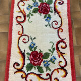 Vintage wool rug with floral decor
