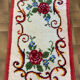 Vintage wool rug with floral decor