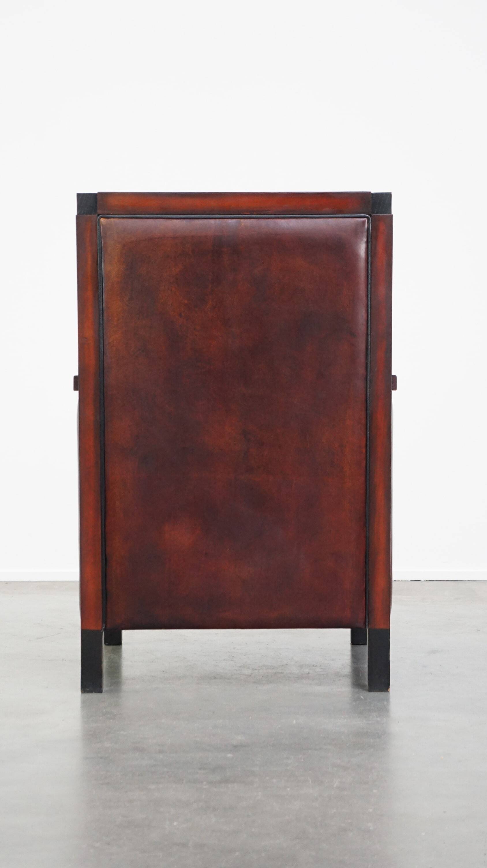 Sheepskin Art Deco design armchair combined with wood