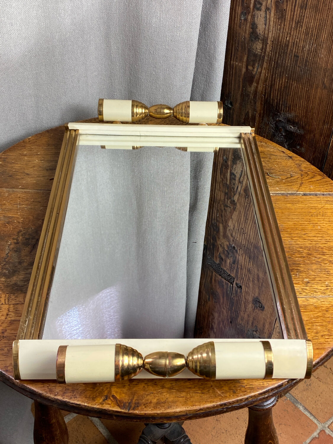 Art Deco tray in bakelite and gilded metal