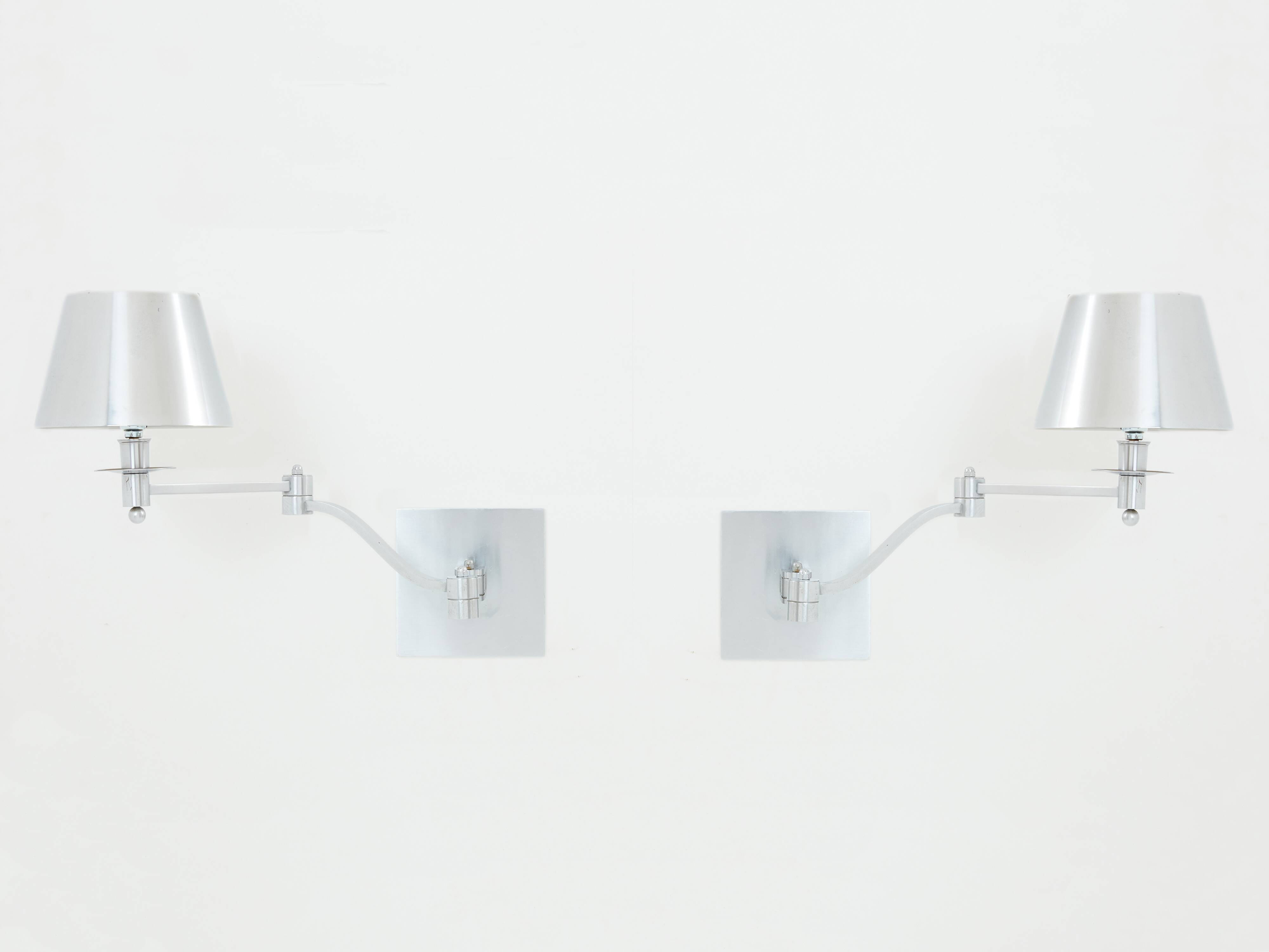Pair of Maison Charles adjustable brushed steel wall lights circa 1960