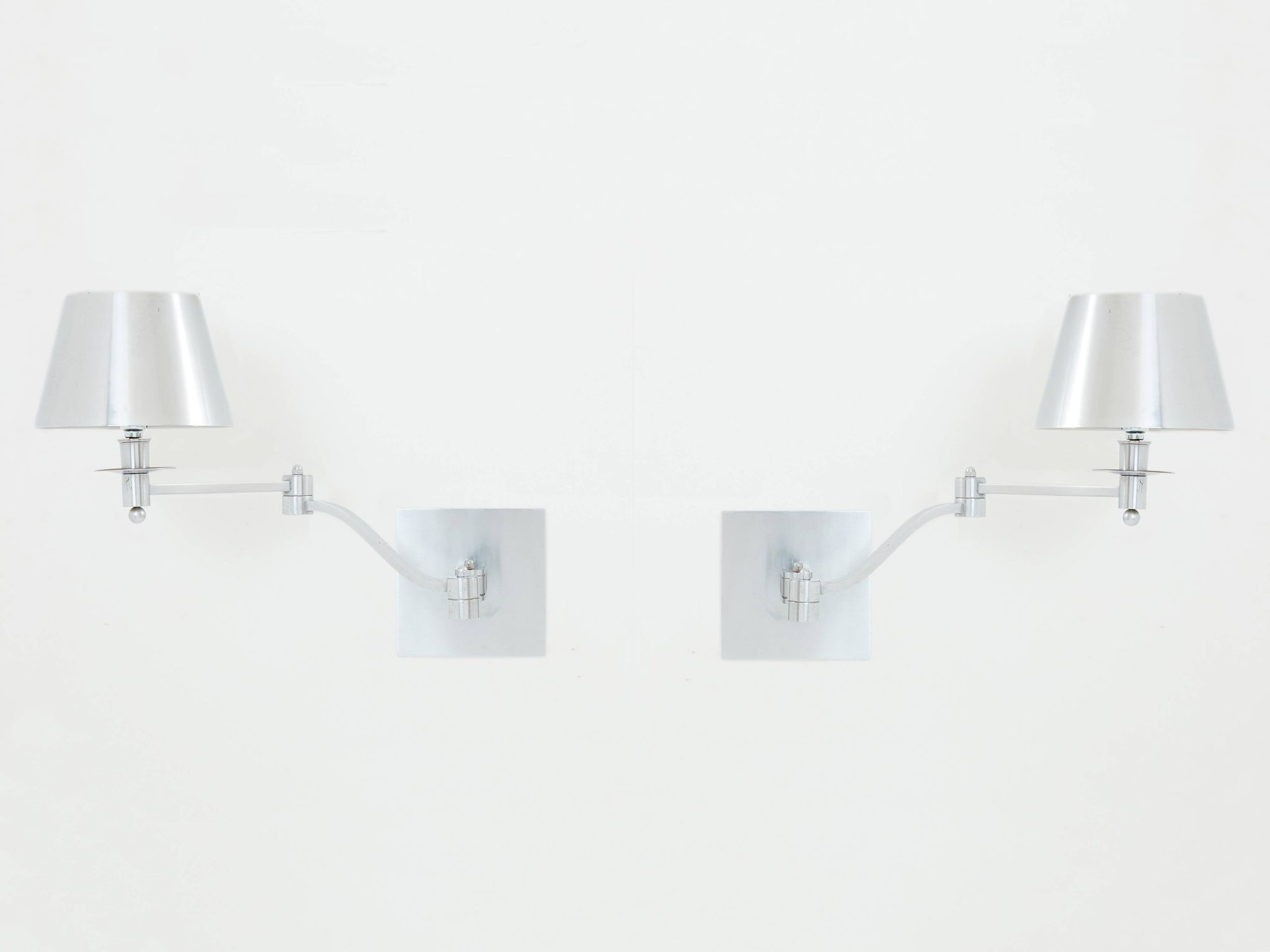 Pair of Maison Charles adjustable brushed steel wall lights circa 1960