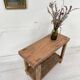 Establishment / console in raw wood