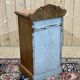 English bedside table in blonde mahogany from the early 20th century.