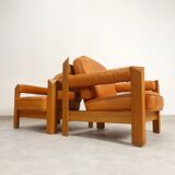 2 fauteuils en chêne et cuir cognac par Skilla