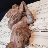 Carved wooden cherub or putto