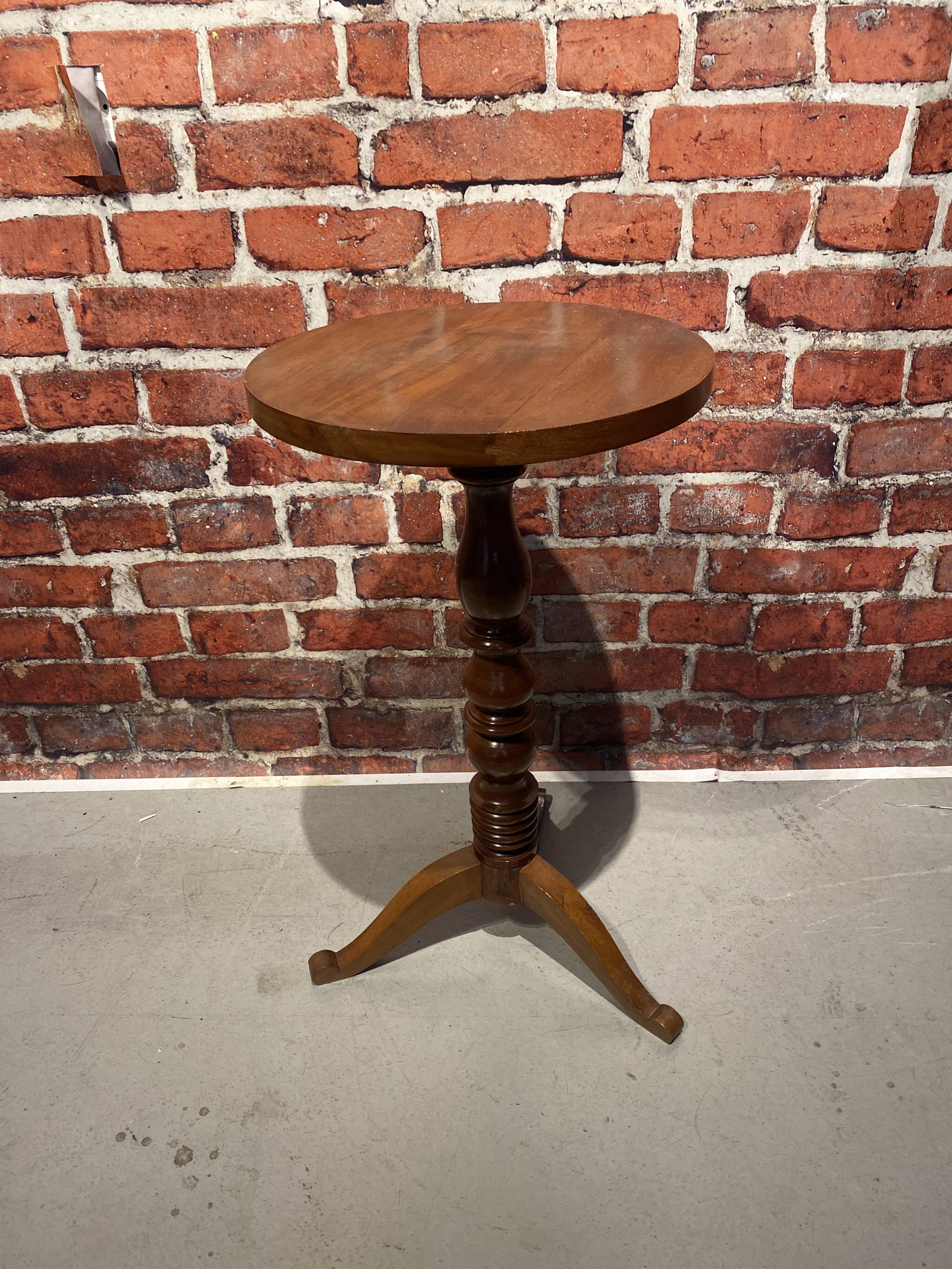 Wooden pedestal table