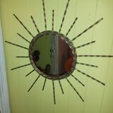 Miroir soleil en fer forgé.