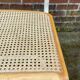 Chaise Cesca modèle b32 en blanc et bois par Marcel Breuer
