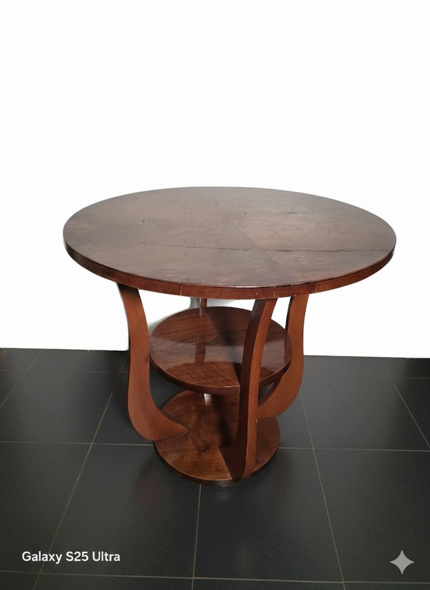 Art Deco walnut gueridon with double top from the 1930s.