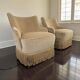 Set of 2 vintage 'gold' armchairs with fringes.