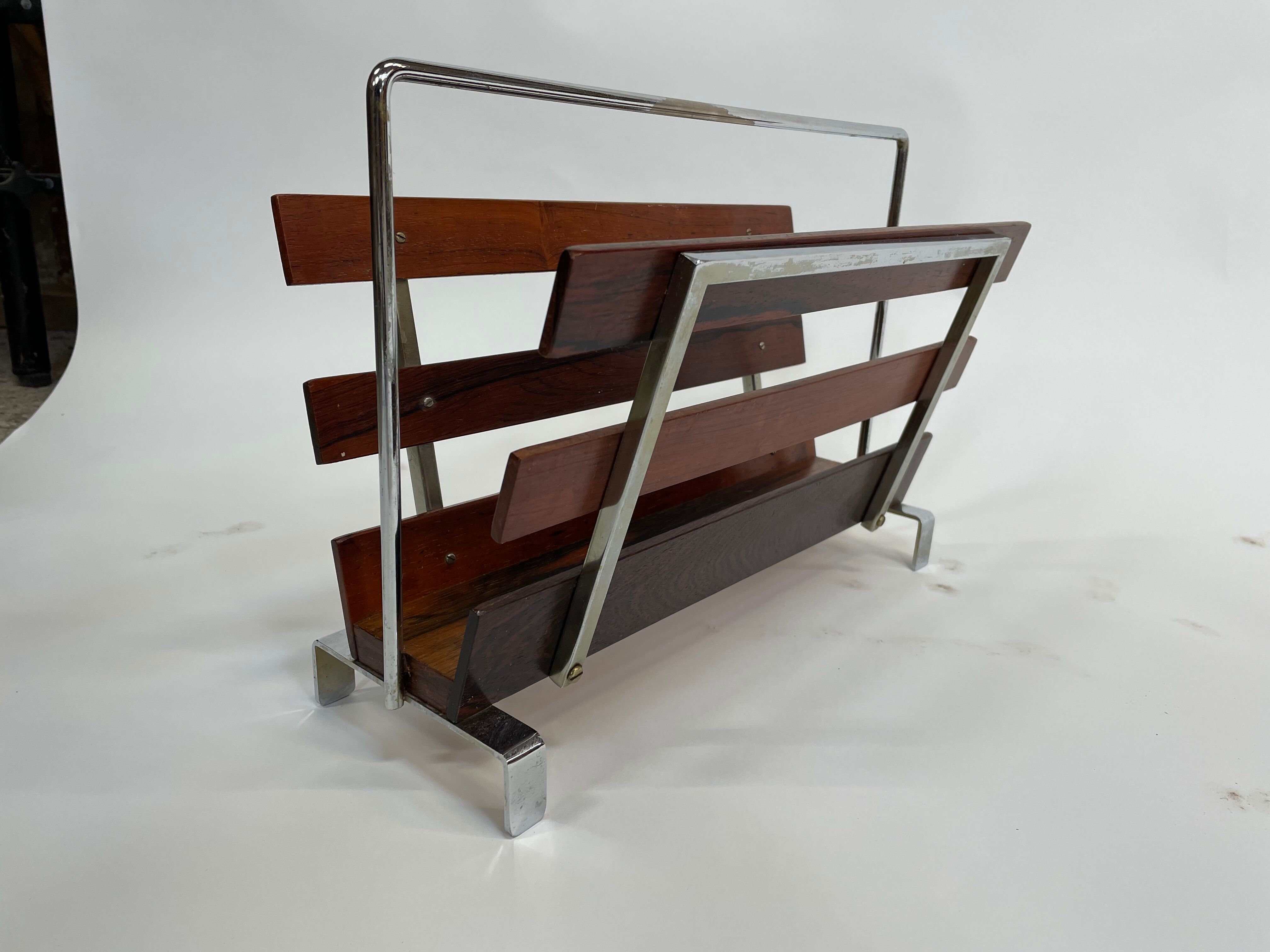 Vintage magazine rack from  rosewood and chrome design
