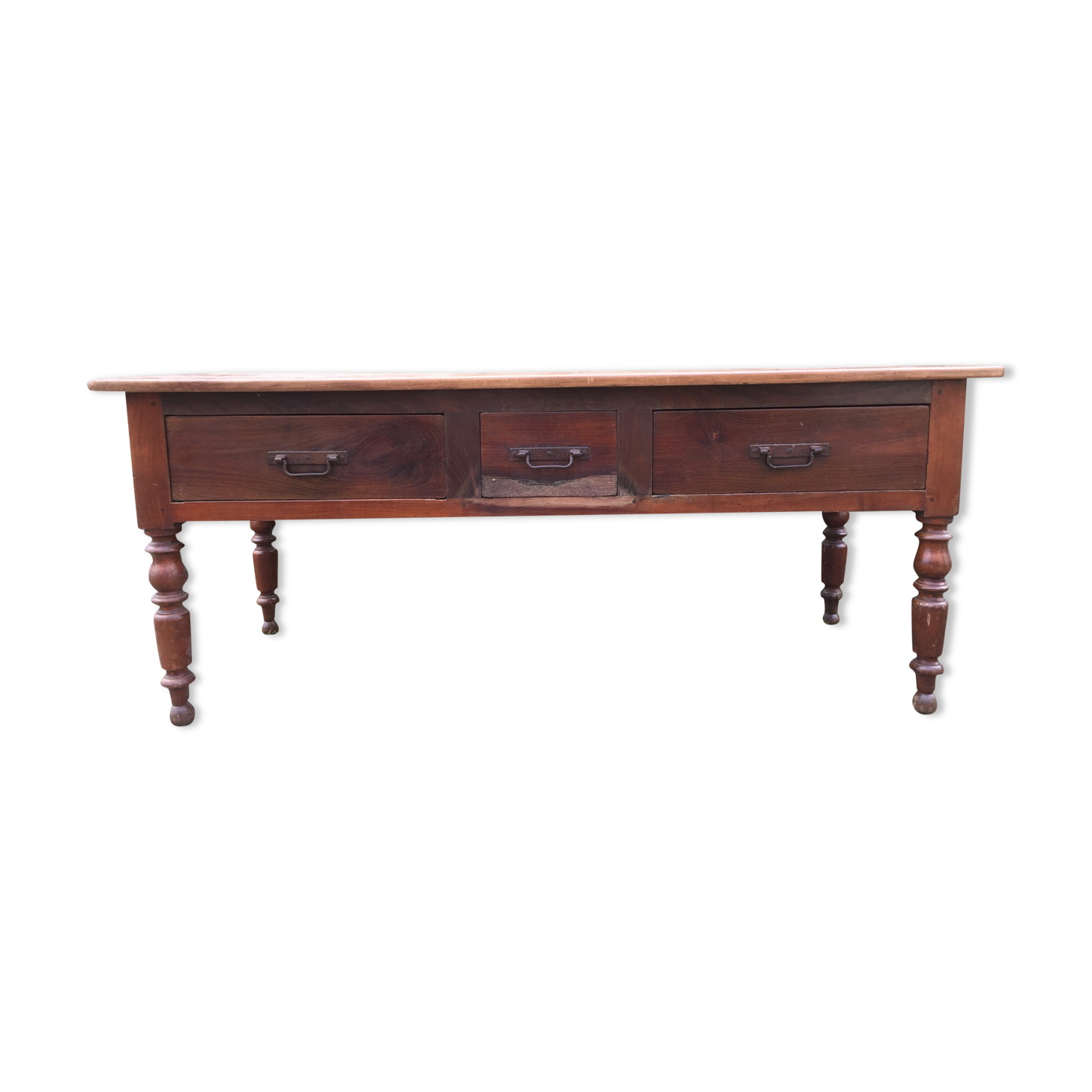Old farmhouse table with cherry and chestnut panels with 3 drawers.