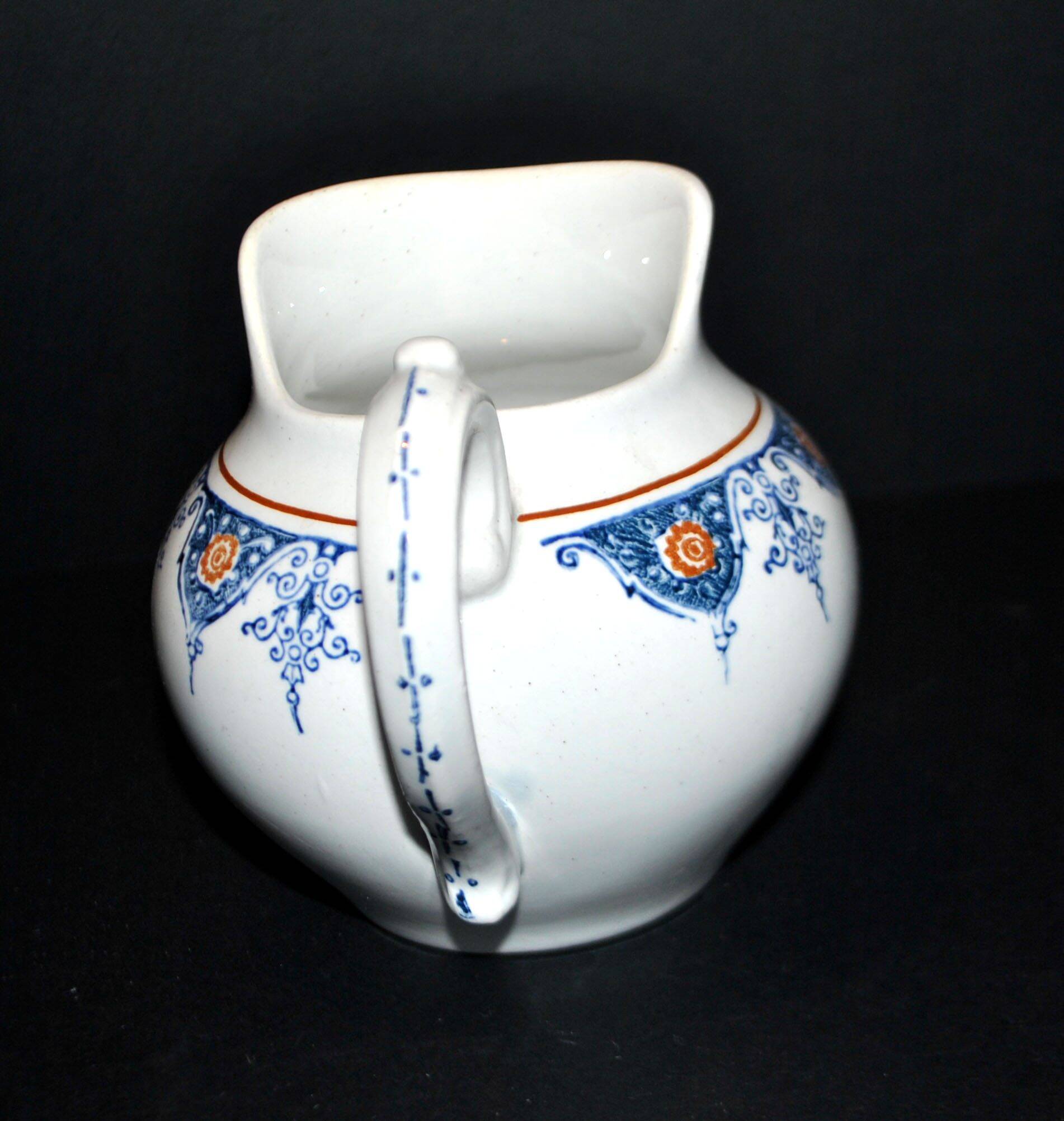 Saint Amand earthenware pitcher with stencil decoration