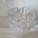 Candle holder or glass warmer with irregular ice effect.