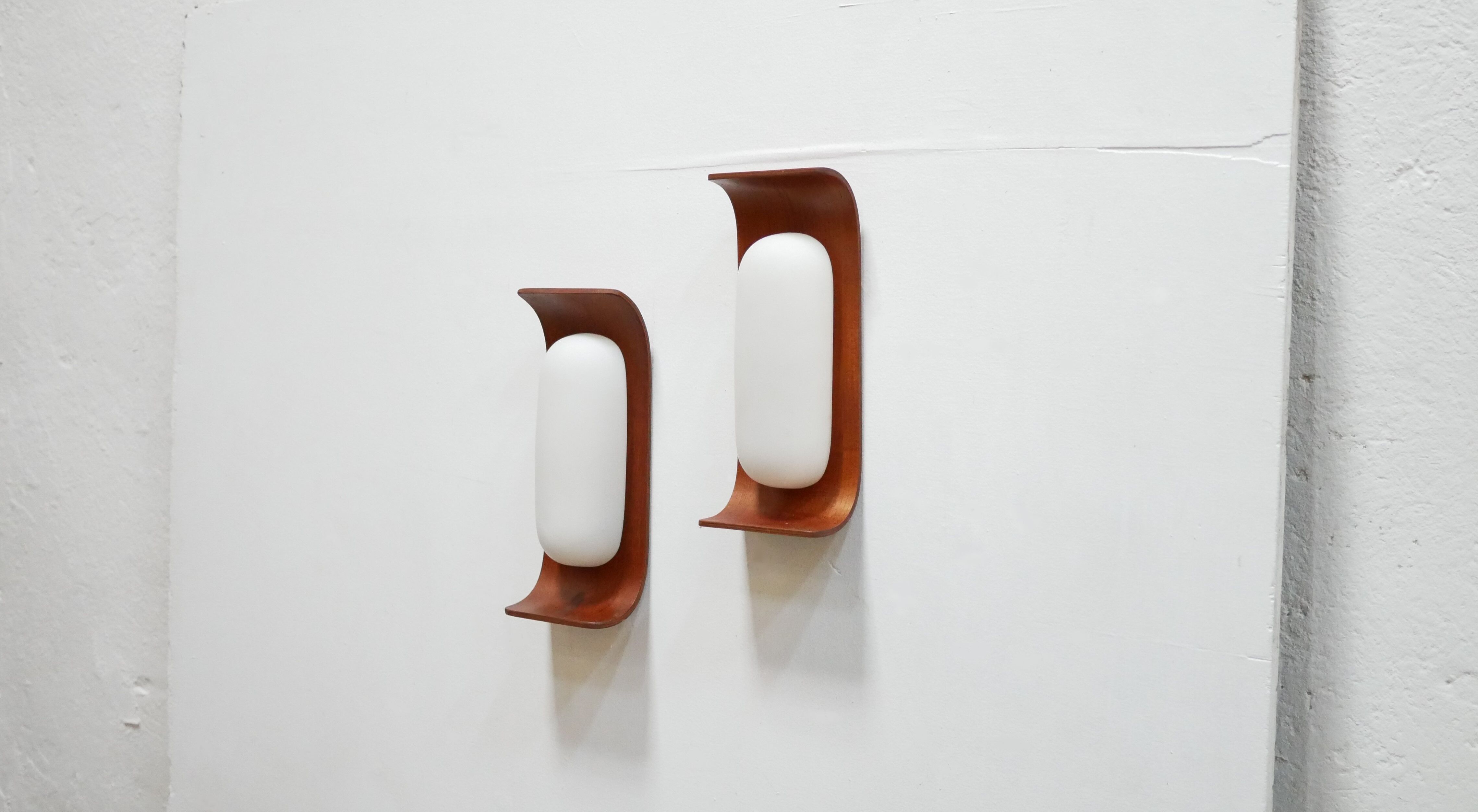 Pair of teak and opaline wall lamps by Goffredo Reggiani