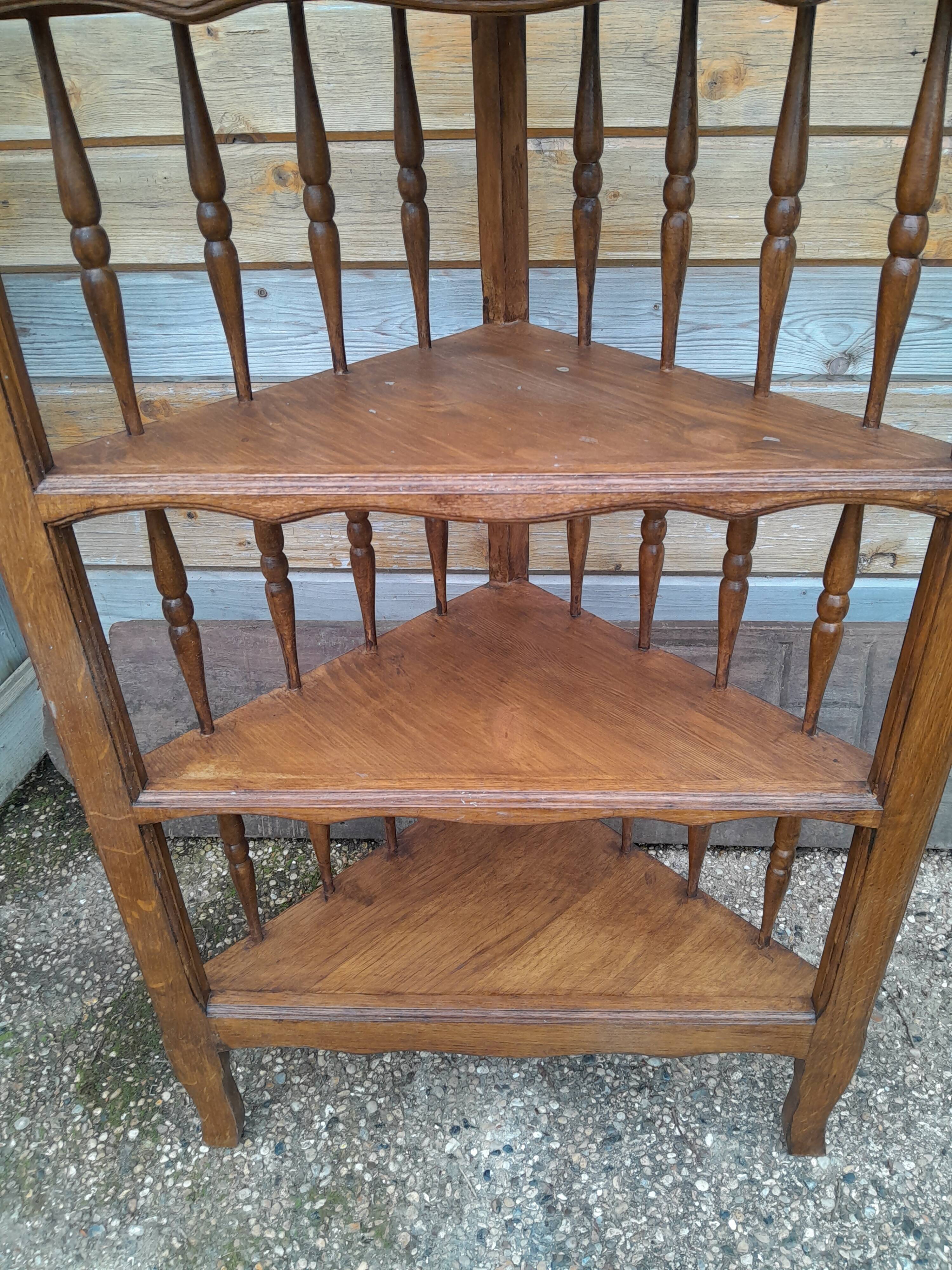 Old wooden corner shelf unit