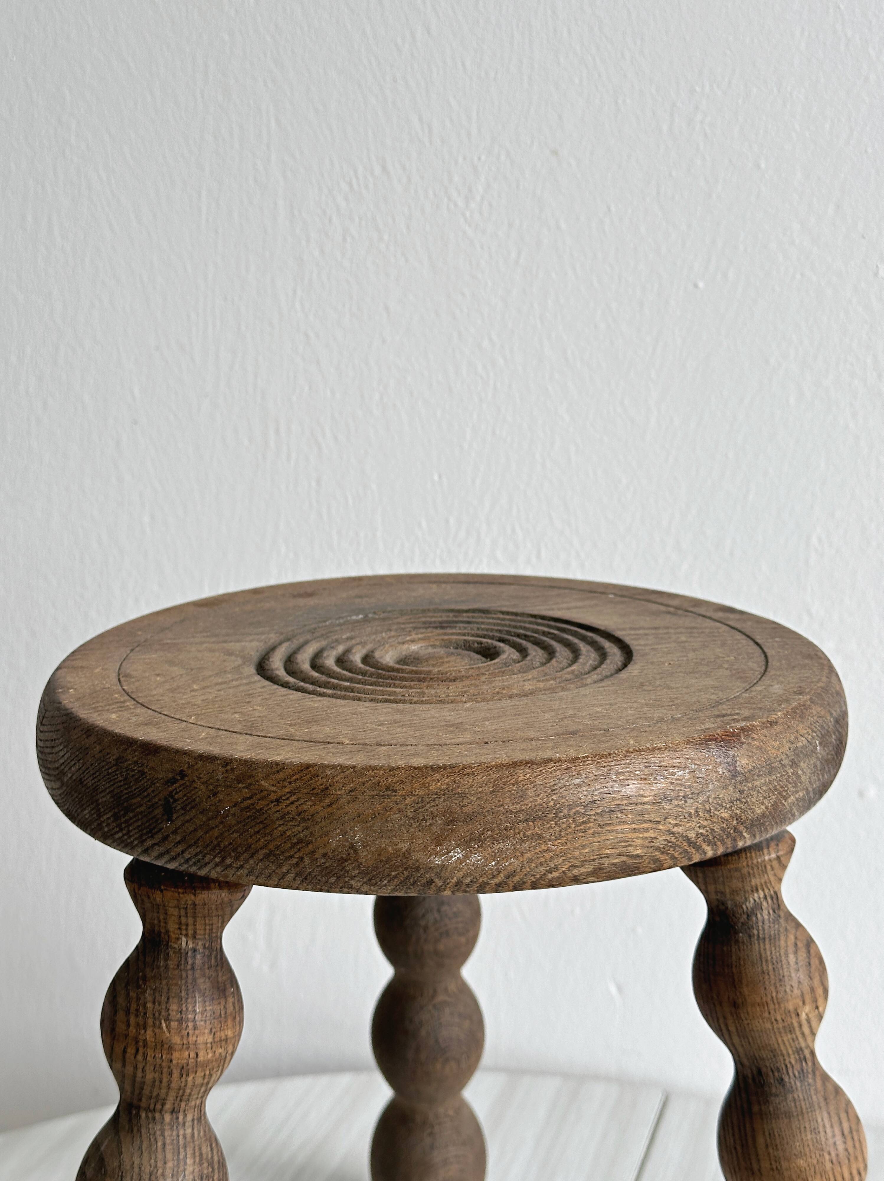 Antique wooden tripod stool