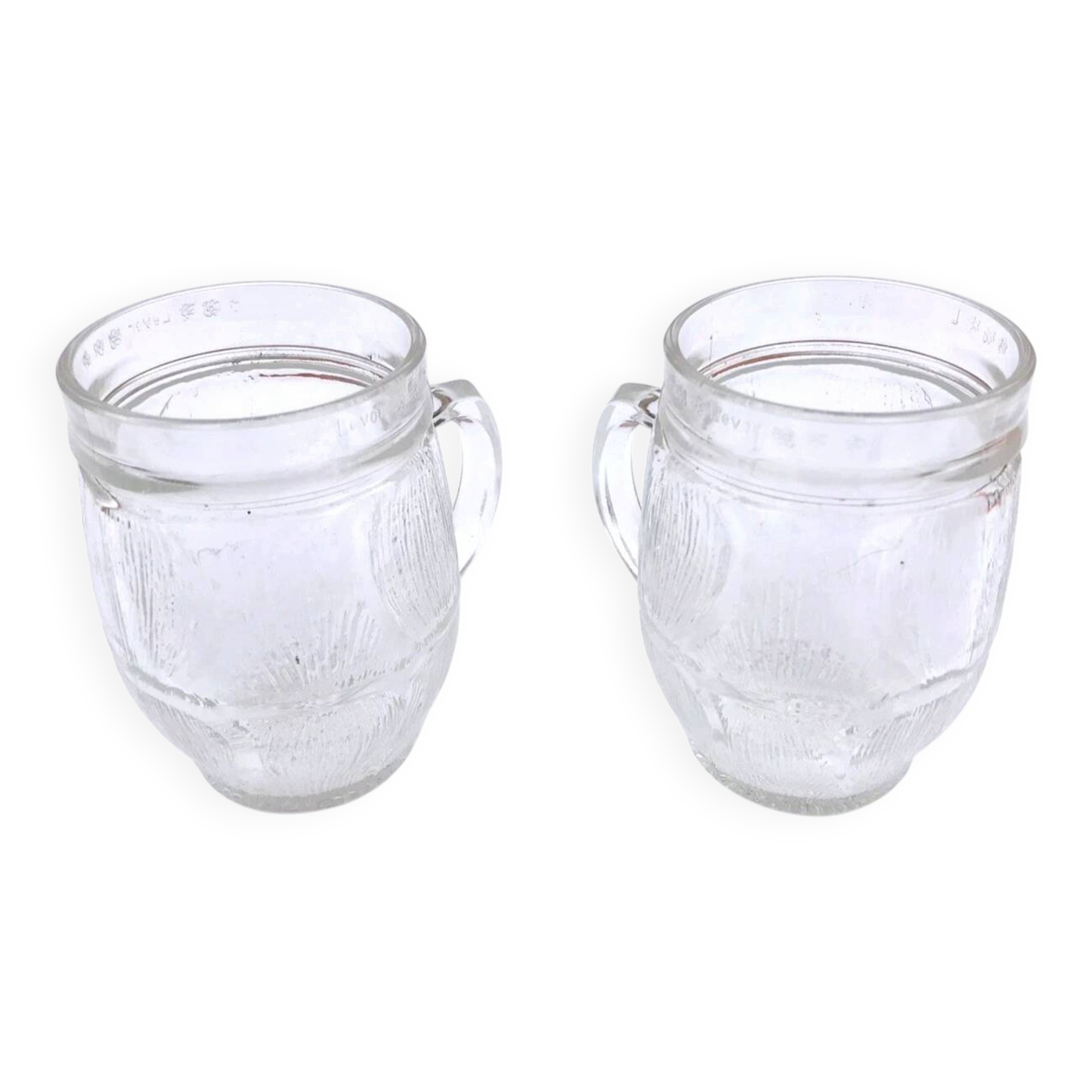 1970s 2 thick transparent glass mugs with textured bark imitation