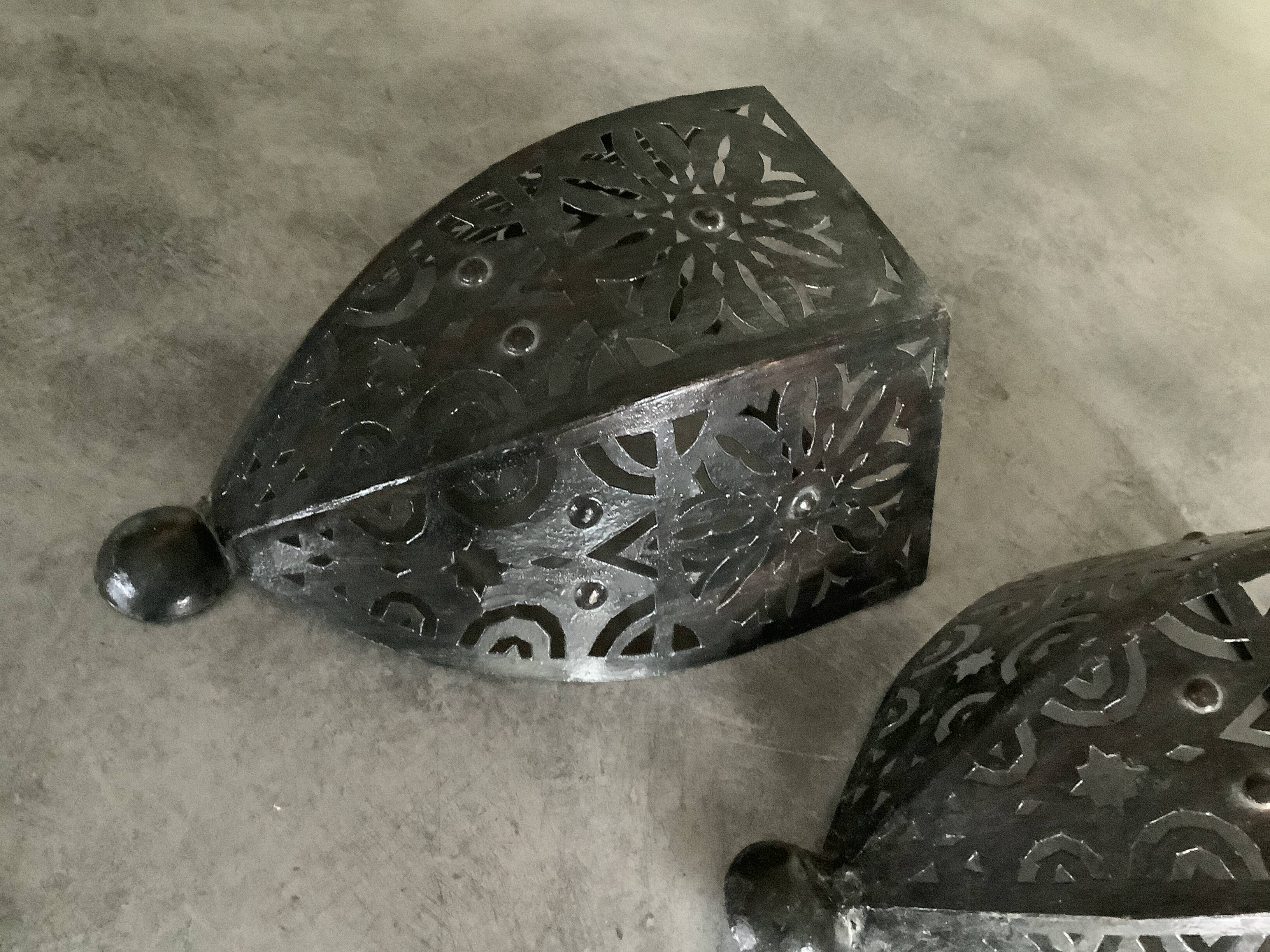 Pair of Wall Sconces in Iron with Cut-Out Patterns