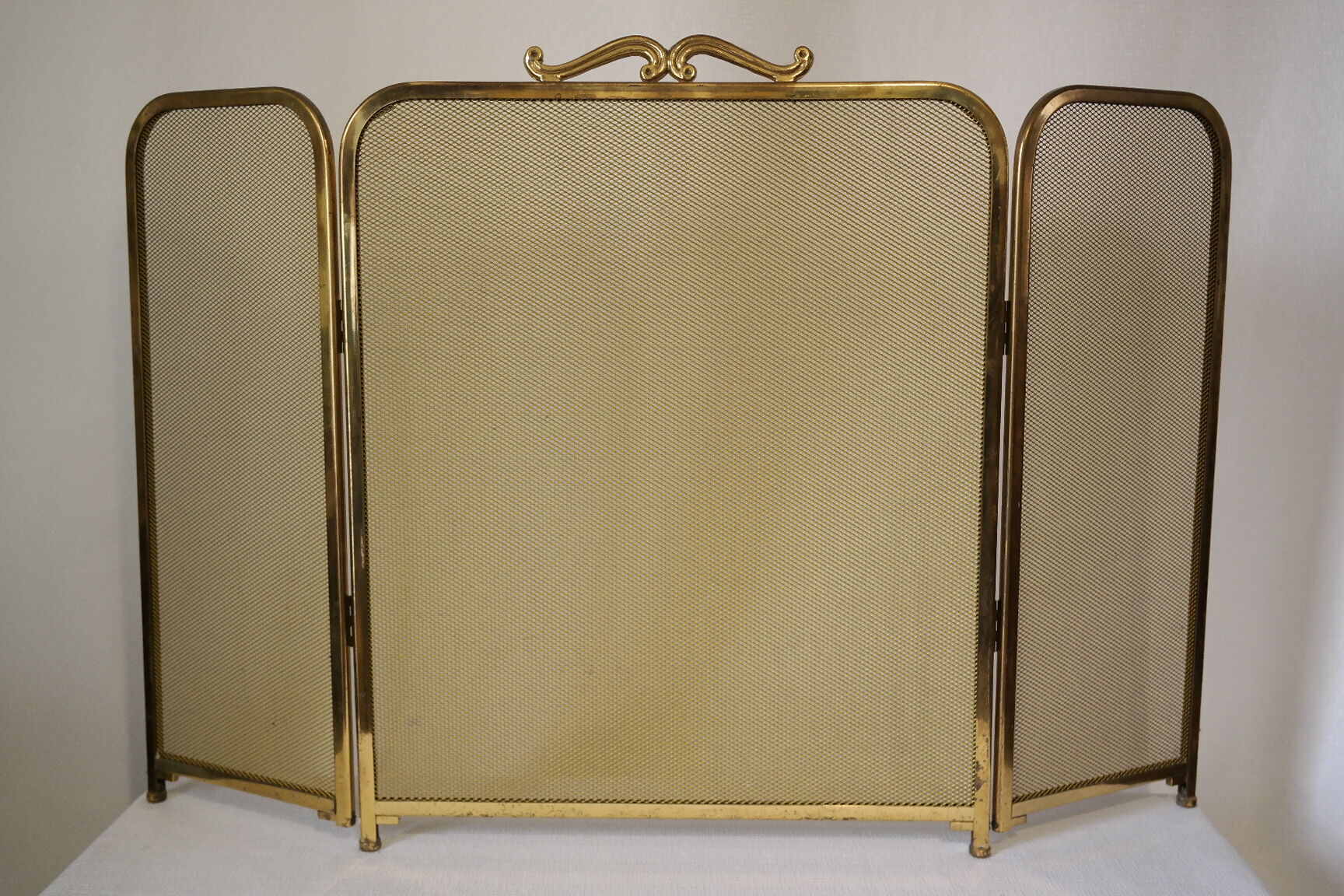 Vintage brass chimney firewall