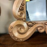 According to the model “the waves” by Jean Boggio: pair of designer gold mirrors circa 1980