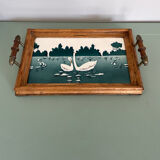 Service platter with a swan design.