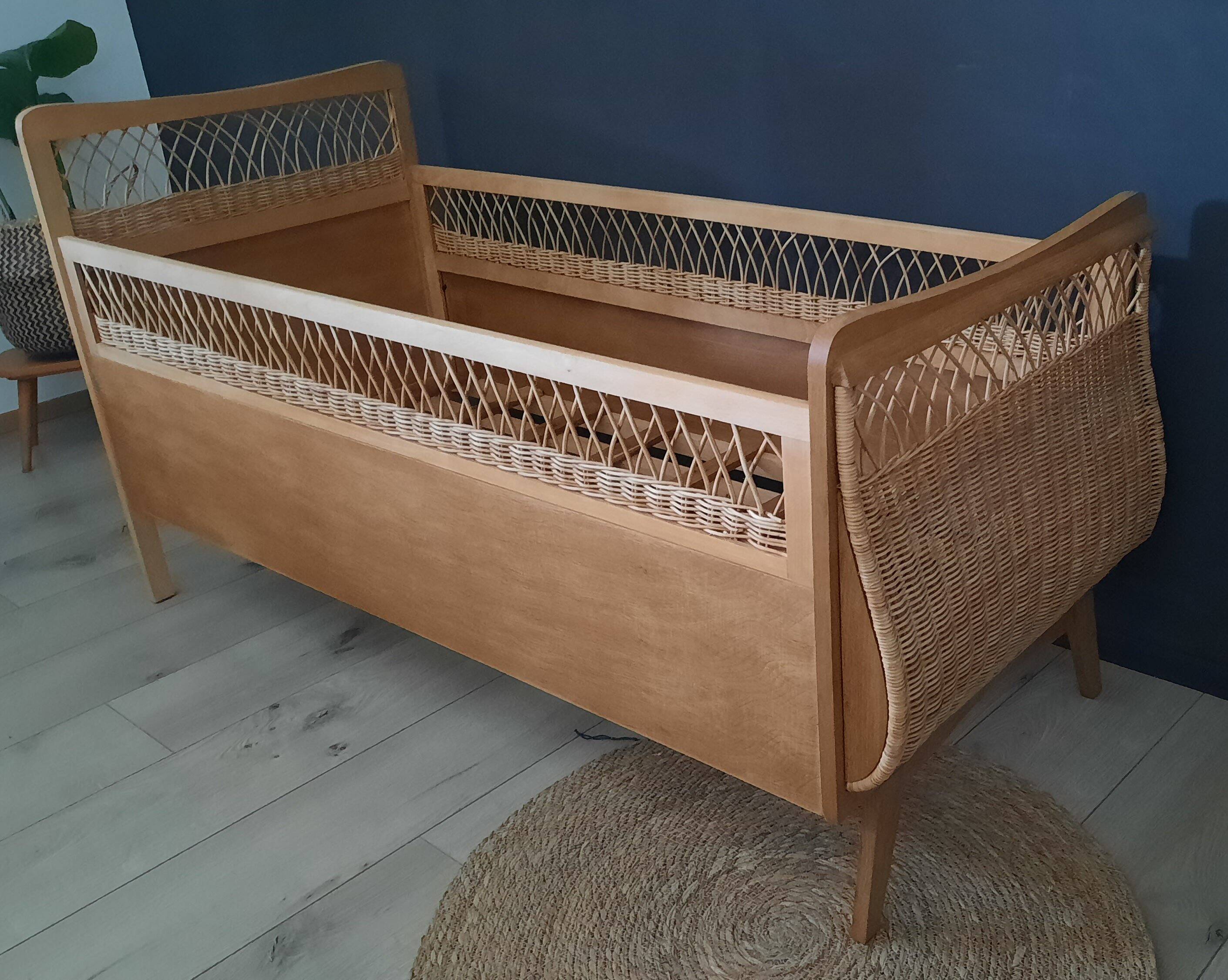 Restored vintage wooden and rattan basket baby bed