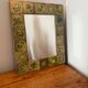 Vintage 1960s green and brown glazed ceramic mirror.