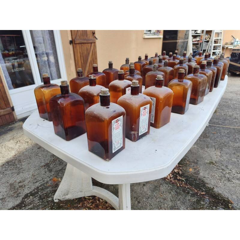 Set of 41 brown glass pharmacy bottles.