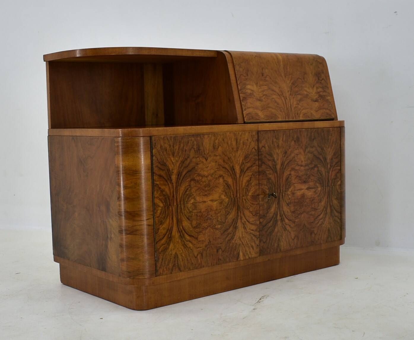 Art Deco cabinet from 1940 made of walnut for UP Závody, Czechoslovakia.