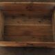 Wooden case with letters in black inck