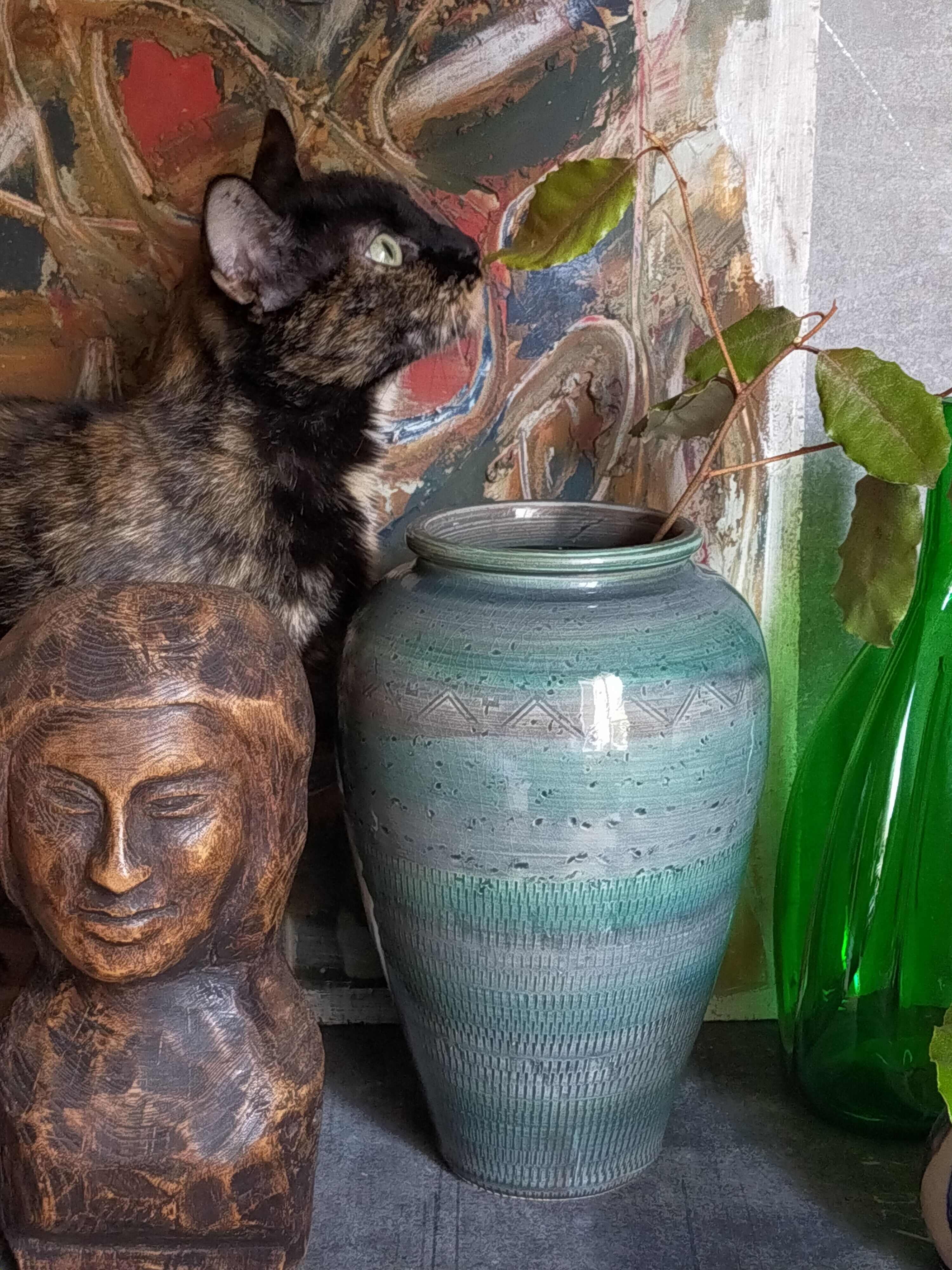 Oblong ceramic vase sacrificed with blue enamel