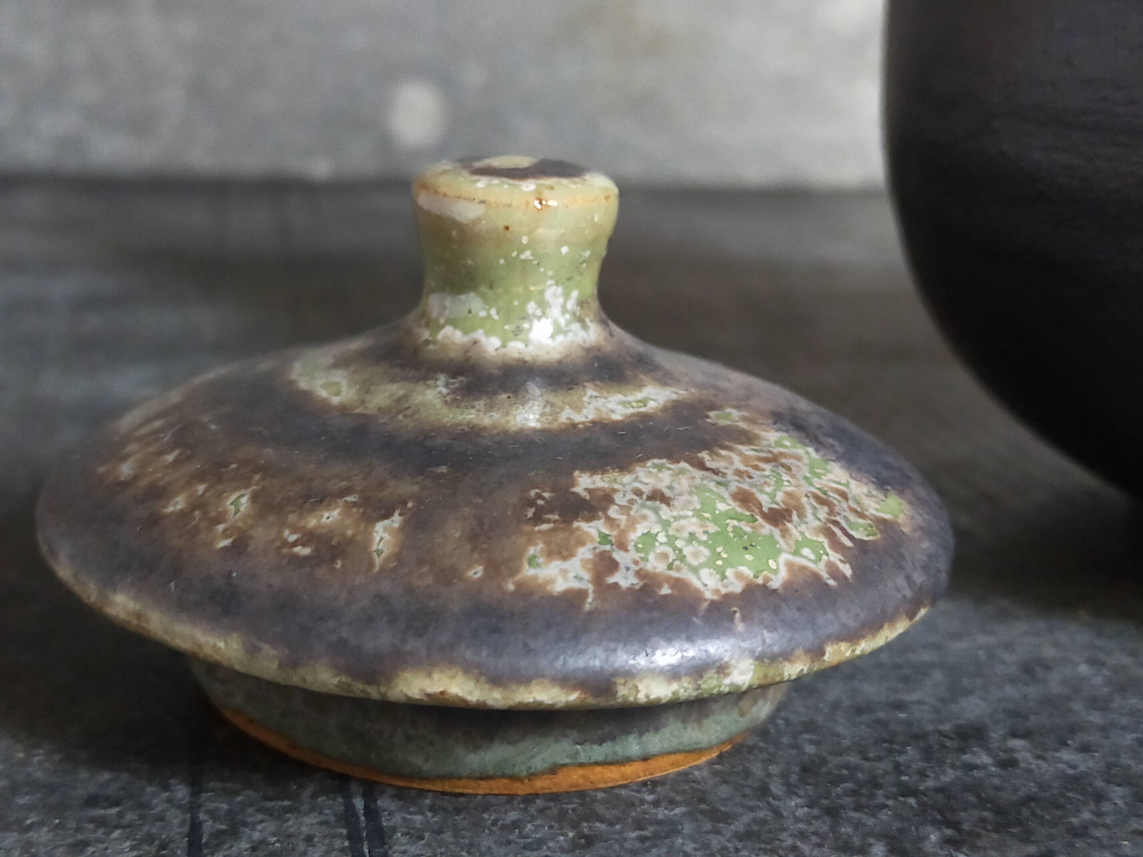 Vintage enameled stoneware potter's teapot