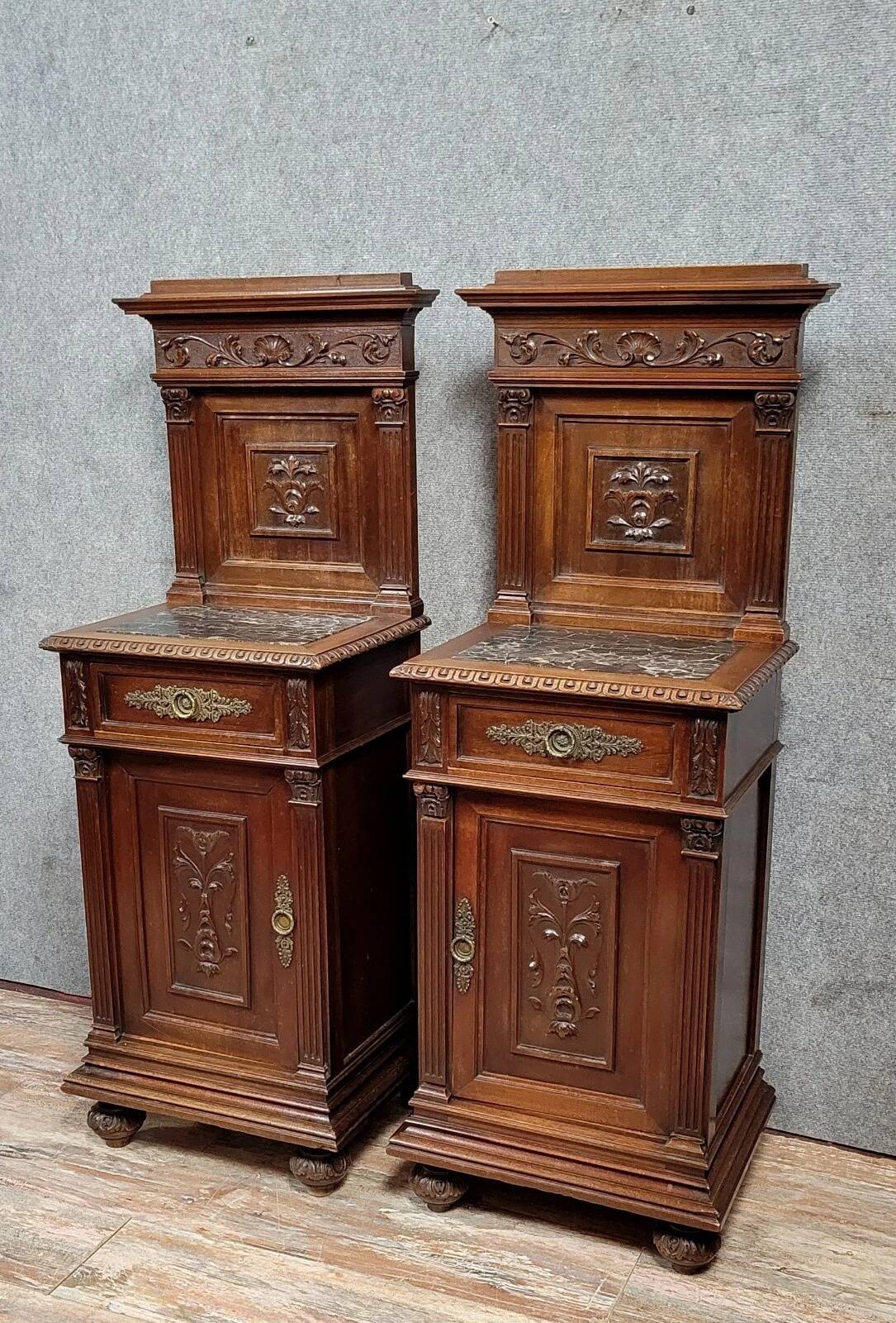 Pair of Renaissance style bedside tables in carved walnut, 19th century