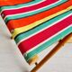 Folding fisherman stool with striped seat