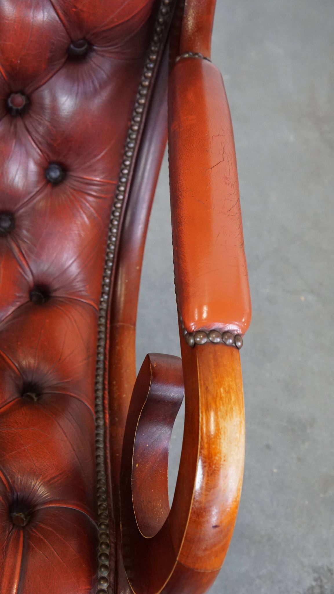 Red cowhide leather English Chesterfield armchair combined with wood