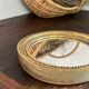 Miroir rond en bois de couleur dorée