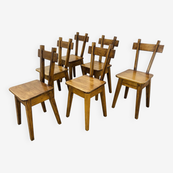 6 brutalist solid wood chairs