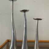 Trio of vintage cast aluminum candlesticks