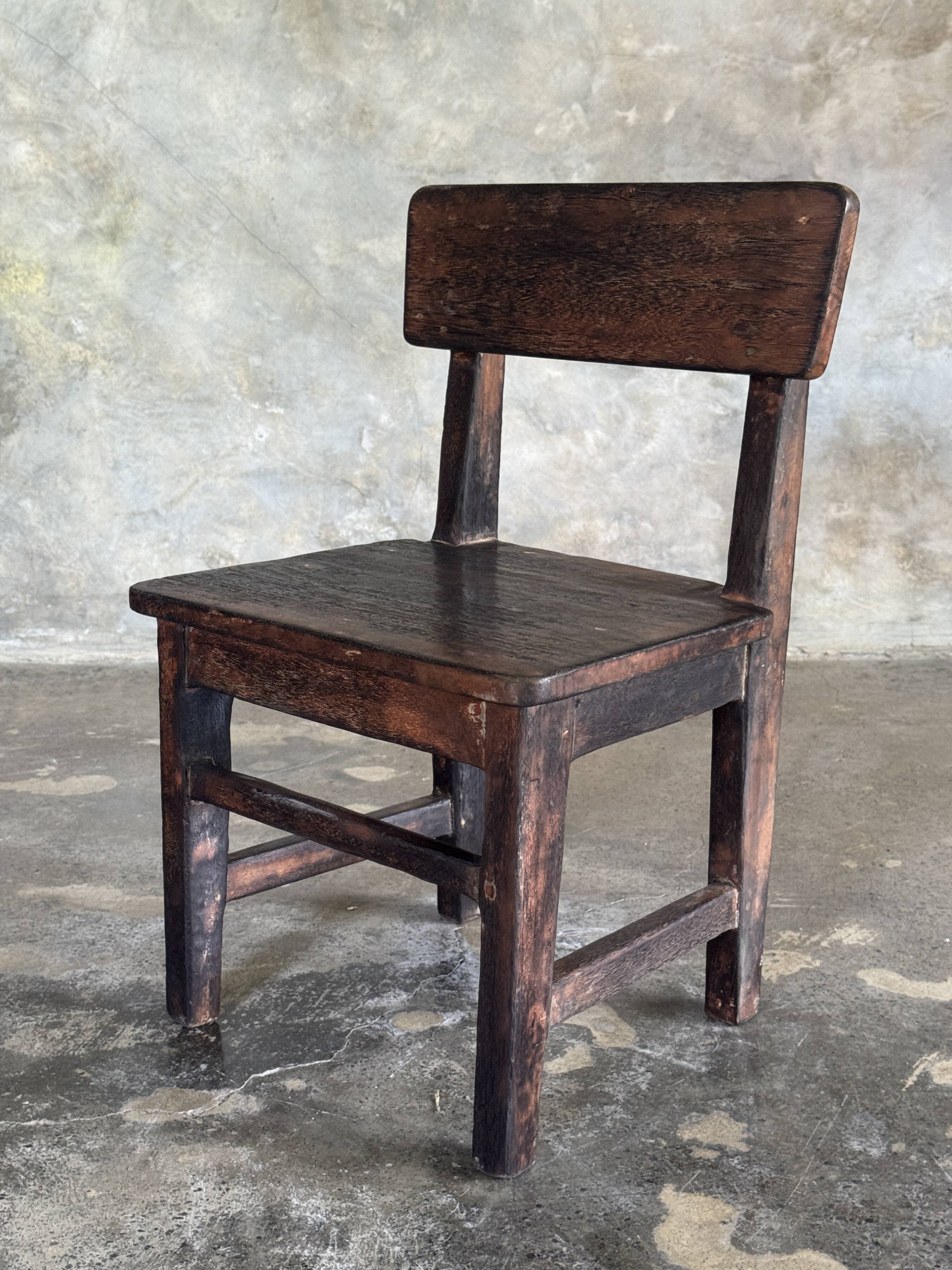 Small antique Indonesian children's chair in teak.