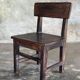 Small antique Indonesian children's chair in teak.